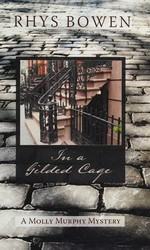 In a gilded cage / Rhys Bowen.